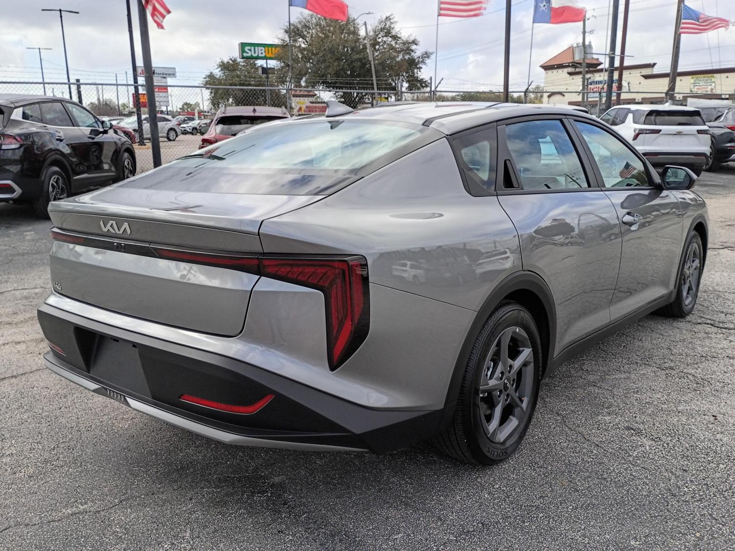 2025 Gray /Black Kia K4 LX (3KPFT4DE1SE) with an 2.0L L4 DOHC 16V engine, CVT transmission, located at 1842 Wirt Road, Houston, TX, 77055, (713) 973-3903, 29.805330, -95.484787 - Photo#4