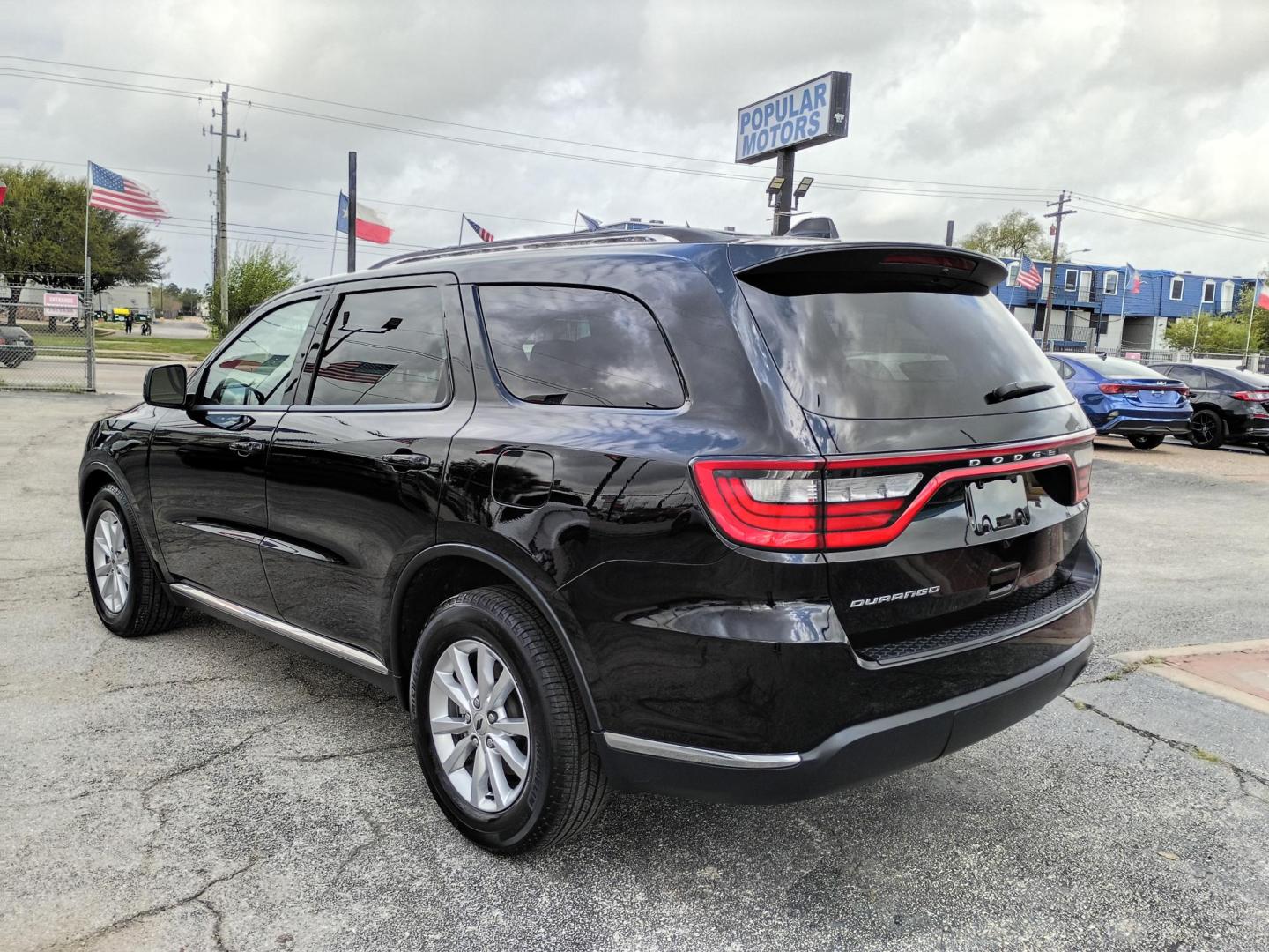 2023 Black /Black Dodge Durango SXT RWD (1C4RDHAG0PC) with an 3.6L V6 DOHC 24V engine, 8A transmission, located at 1842 Wirt Road, Houston, TX, 77055, (713) 973-3903, 29.805330, -95.484787 - Photo#2