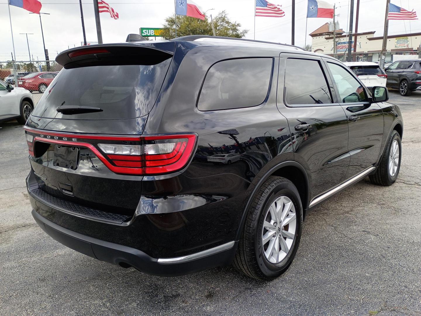 2023 Black /Black Dodge Durango SXT RWD (1C4RDHAG0PC) with an 3.6L V6 DOHC 24V engine, 8A transmission, located at 1842 Wirt Road, Houston, TX, 77055, (713) 973-3903, 29.805330, -95.484787 - Photo#4